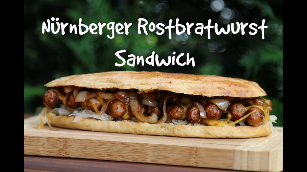 Sandwich mit original Nürnberger Rostbratwürsten, Sauerkraut, Röstzwiebel und Cheddar