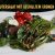 Wildkräutersalat mit gegrilltem grünen Spargel, Feta und Pinienkernen